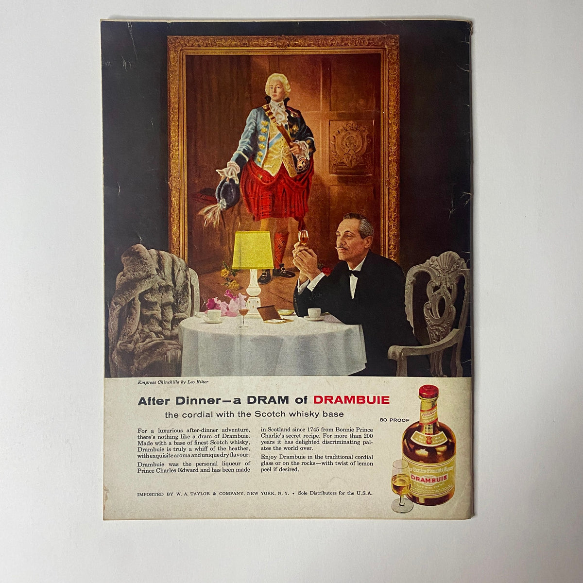 Back cover of Gourmet Magazine September 1956 showcasing an advertisement for Drambuie whisky, featuring a gentleman dining elegantly with a bottle of the beverage.
