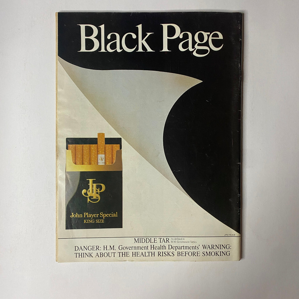 Black page advertisement from Car Magazine UK Import October 1982, promoting John Player Special cigarettes with a warning about health risks associated with smoking.