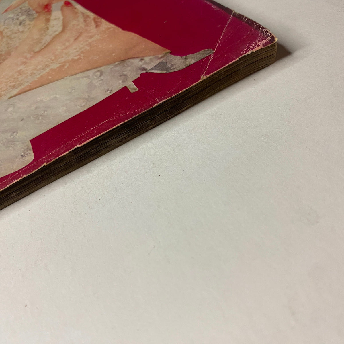 Vogue Magazine December 1953 Kathleen Wallace by Erwin Blumenfeld GD Interior capturing the edge of the magazine cover with visible creases and damage.