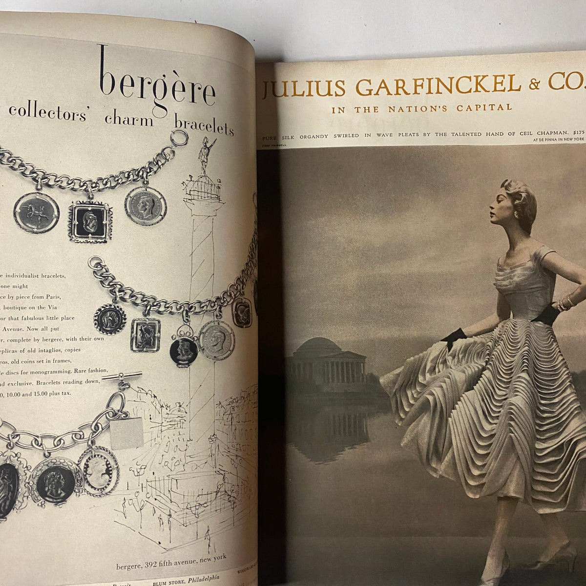 Vogue Magazine March 1, 1954 featuring a vintage advertisement for Bergère collectors charm bracelets next to a fashion illustration of a model in a stylish gown from Julius Garfinkel & Co. in the nation's capital.