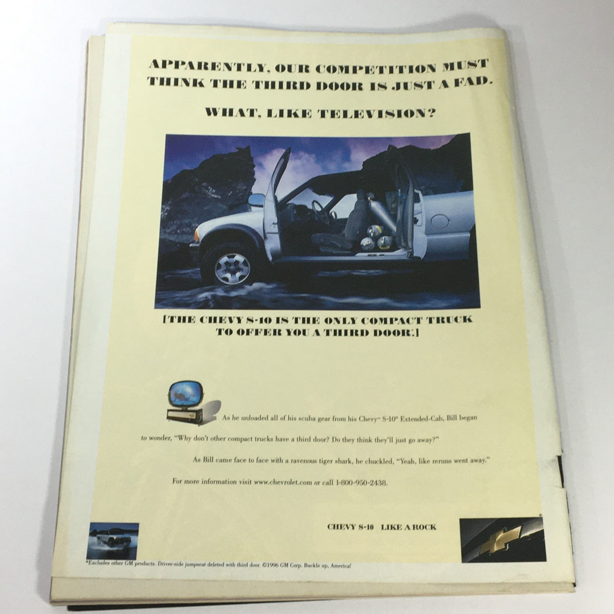 Advertisement from Motor Cyclist Magazine March 1997 for Chevy S-10 truck with a focus on its unique third door feature.