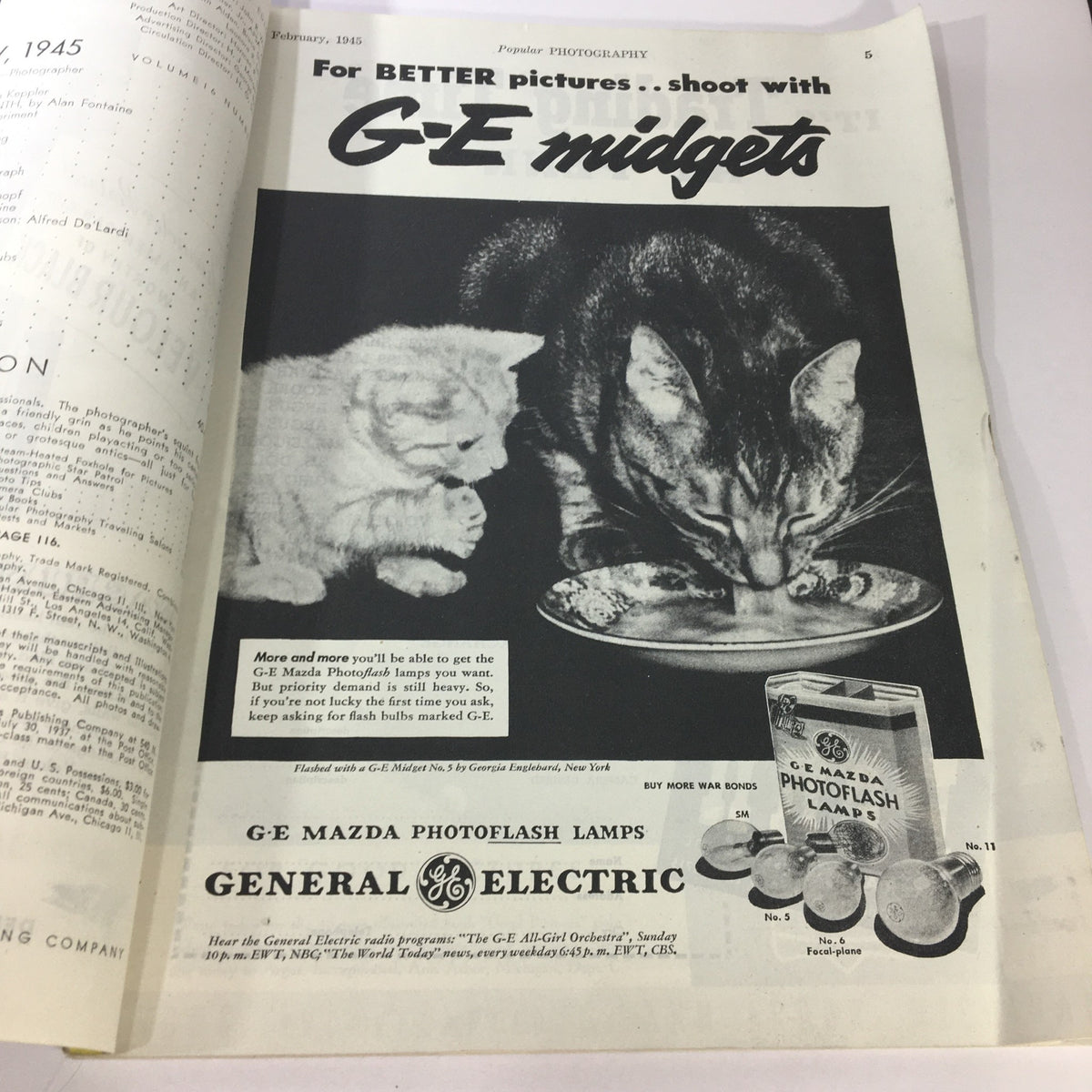 Advertisement from Popular Photography Magazine February 1945, promoting G-E Mazda Photoflash Lamps with playful imagery of cats.