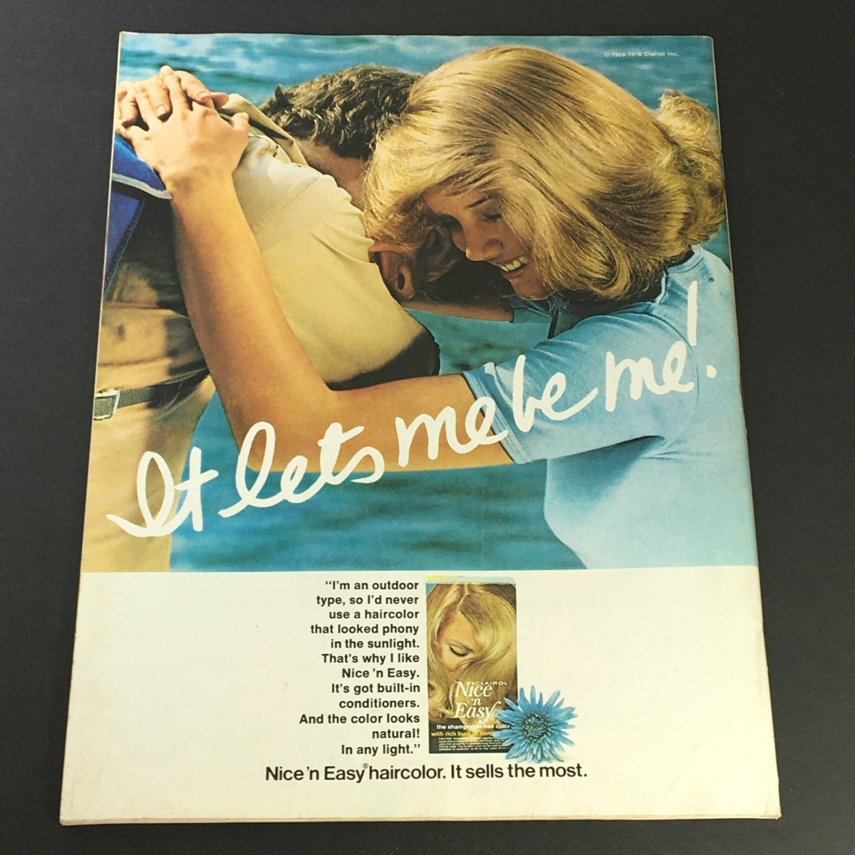 Cover of the May 1977 'Women Sports Magazine' featuring Billie Jean King and Sue Barker, showcasing a vintage hairstyle advertisement with a couple in an affectionate embrace, promoting Nice 'n Easy haircolor.