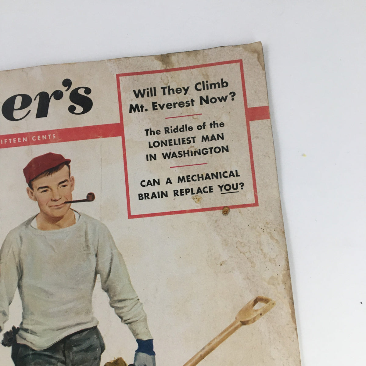 Detail of the cover text on VTG Collier's Magazine April 4, 1953, highlighting articles such as 'Will They Climb Mt. Everest Now?' and 'Can a Mechanical Brain Replace You?'