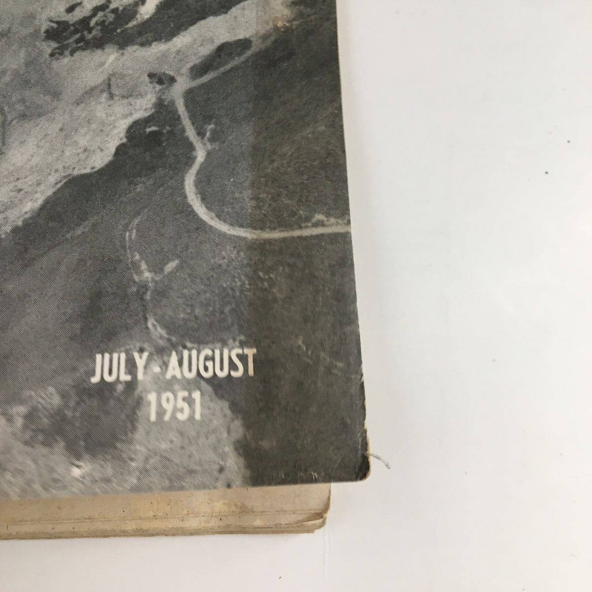 Side view of the California Highways and Public Works July 1951 magazine cover displaying the title, July-August 1951, and imagery of California's landscapes.