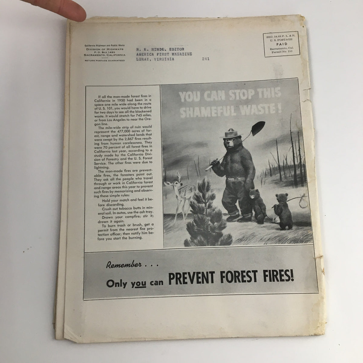 Back cover of California Highways and Public Works July 1951 magazine featuring a warning against forest fires with a bear illustration promoting fire prevention.