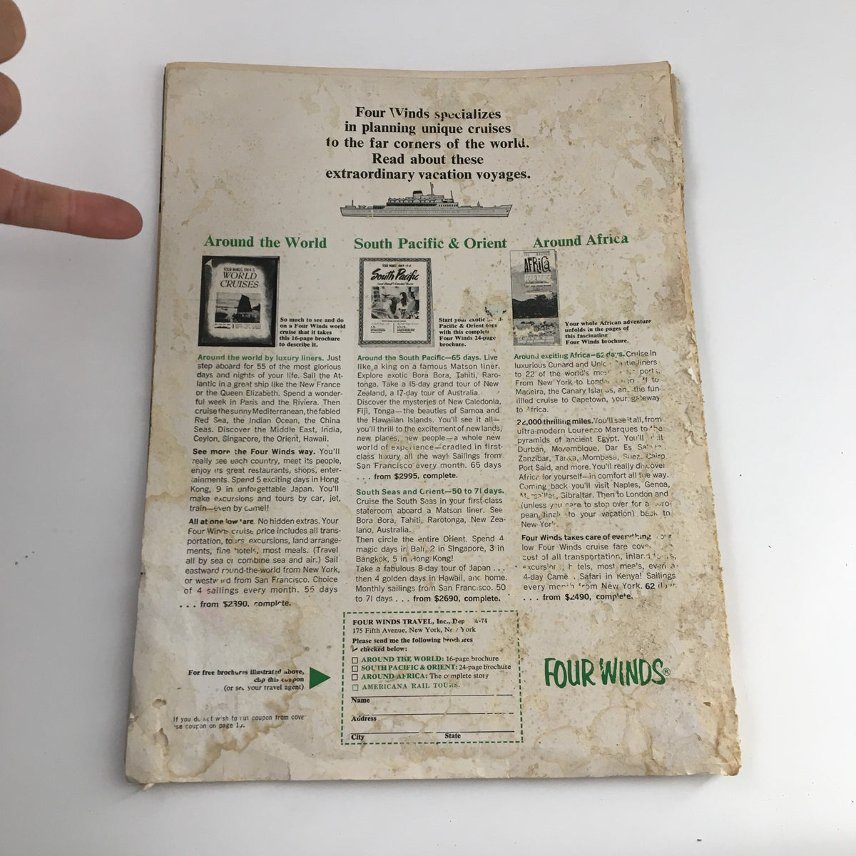 Back cover of Travel Magazine June 1965 featuring an advertisement for Four Winds Travel cruises around the world.