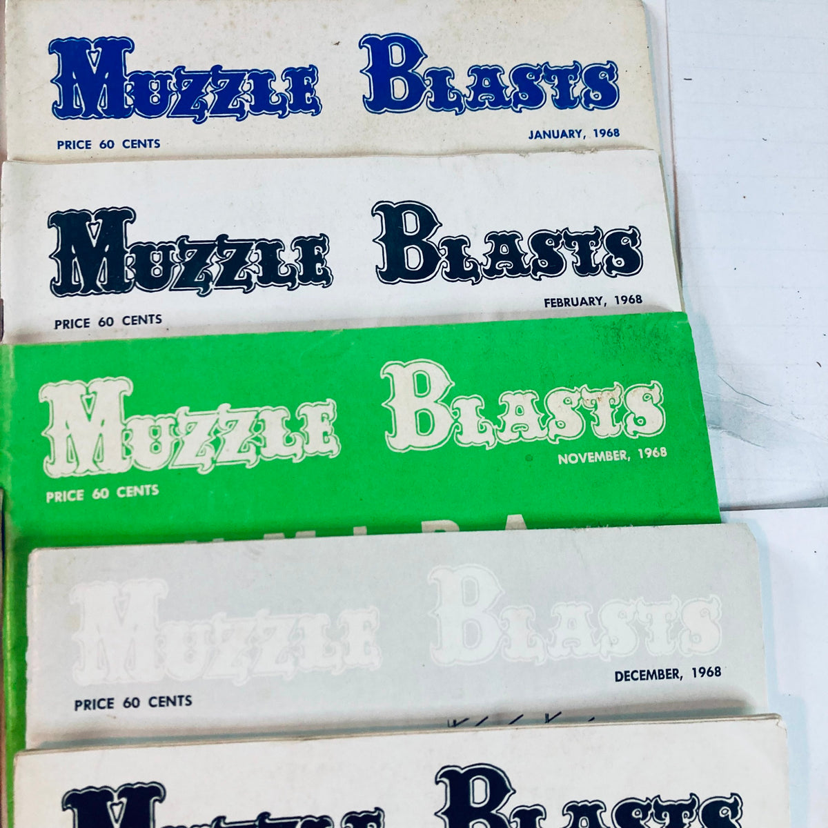 Lot of 21 Muzzle Blasts Magazines featuring January to December 1968 covers, reflecting vintage issues on muzzleloading and traditional crafts.