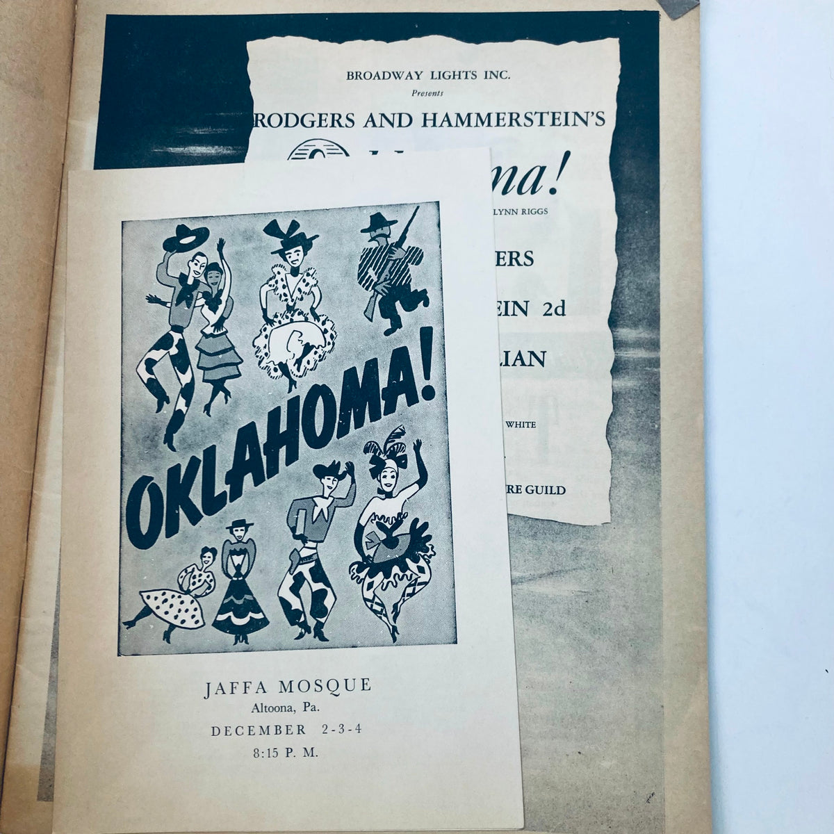 Inside pages of the VTG 1953 Oklahoma! Stage Play Souvenir Program showing a black and white illustration of dancers and details about the performance.
