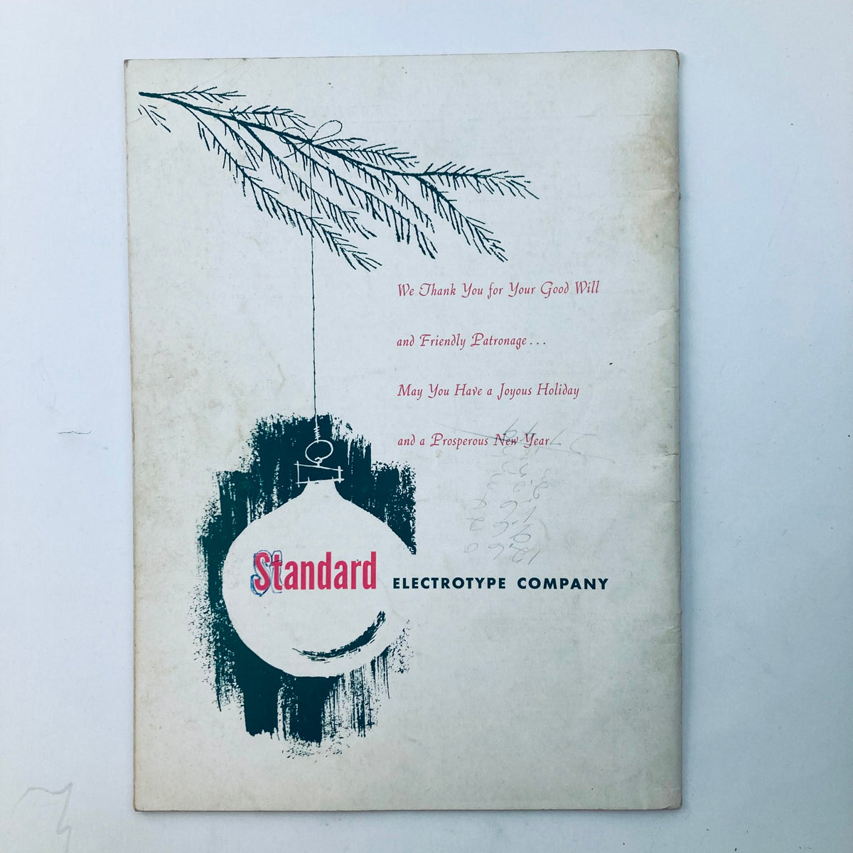 Back cover of the VTG Typo Graphic Magazine December 1955 featuring a holiday greeting card design from Standard Electrotype Company.