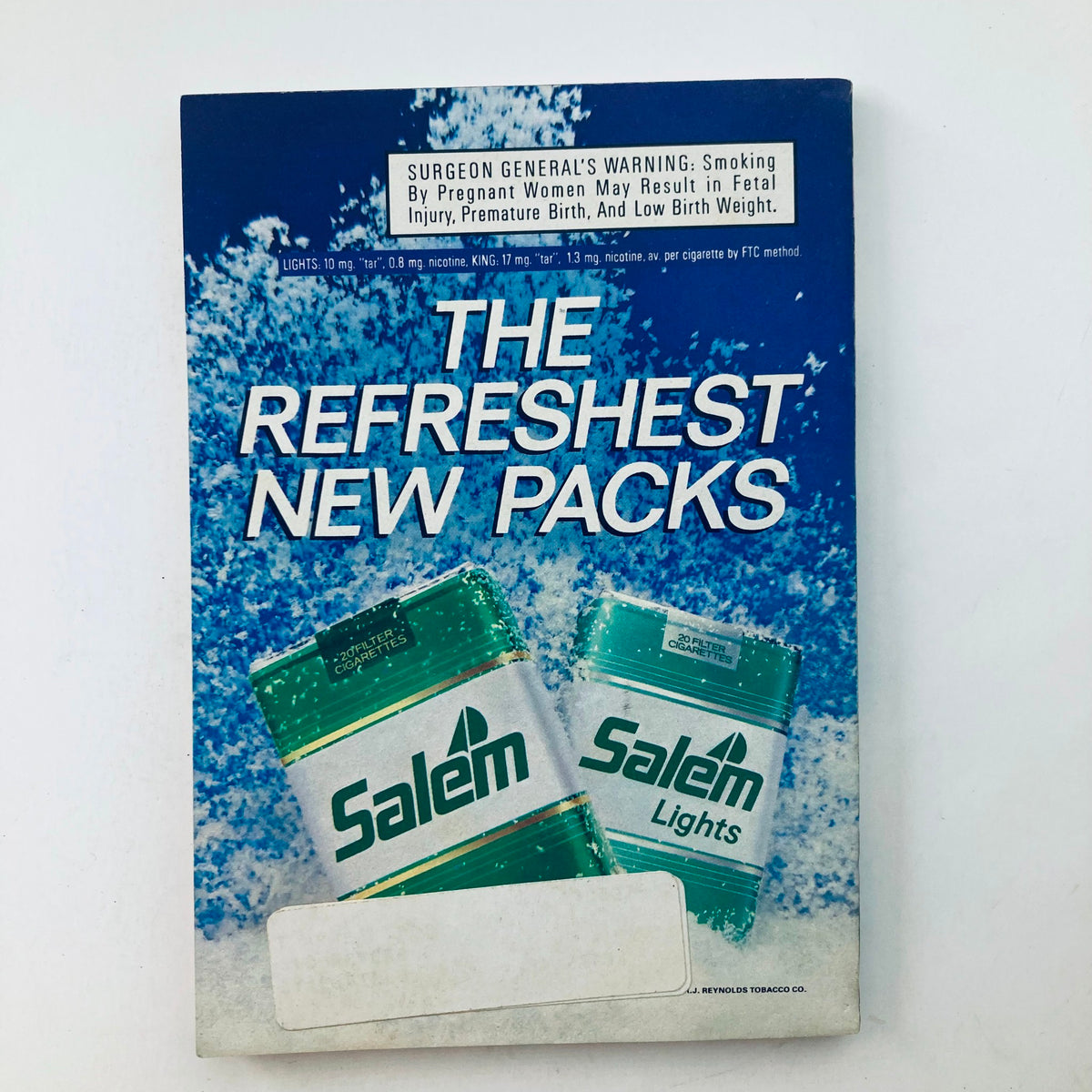 Back cover of VTG The Cable Guide Magazine March 1988 Vol 7 No. 75 displaying an advertisement for Salem Lights cigarettes with a blue water-themed design.