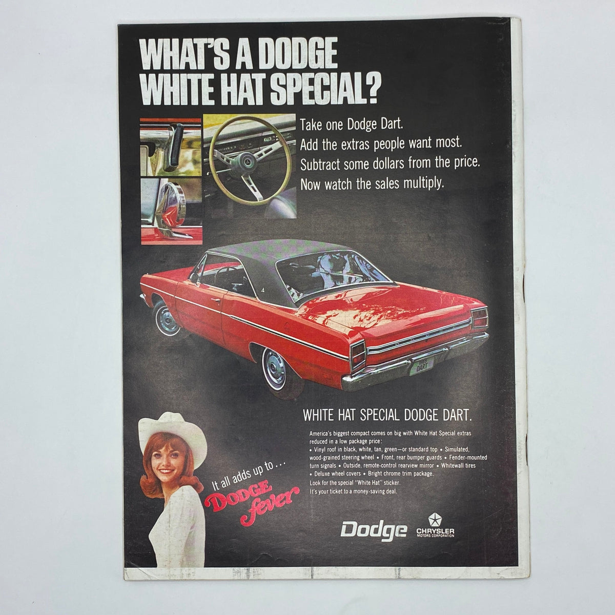 Vintage advertisement in The New Yorker for Dodge featuring the White Hat Special Dodge Dart with a stylish car design and promotional text.