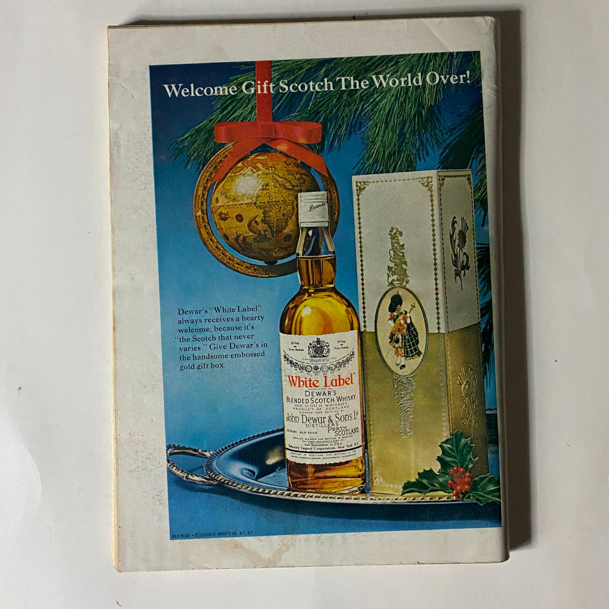 Front cover advertisement from The New Yorker magazine, November 5, 1966, promoting Dewar's White Label Scotch whisky in an elegant setting with a globe ornament, conveying a festive gift theme.