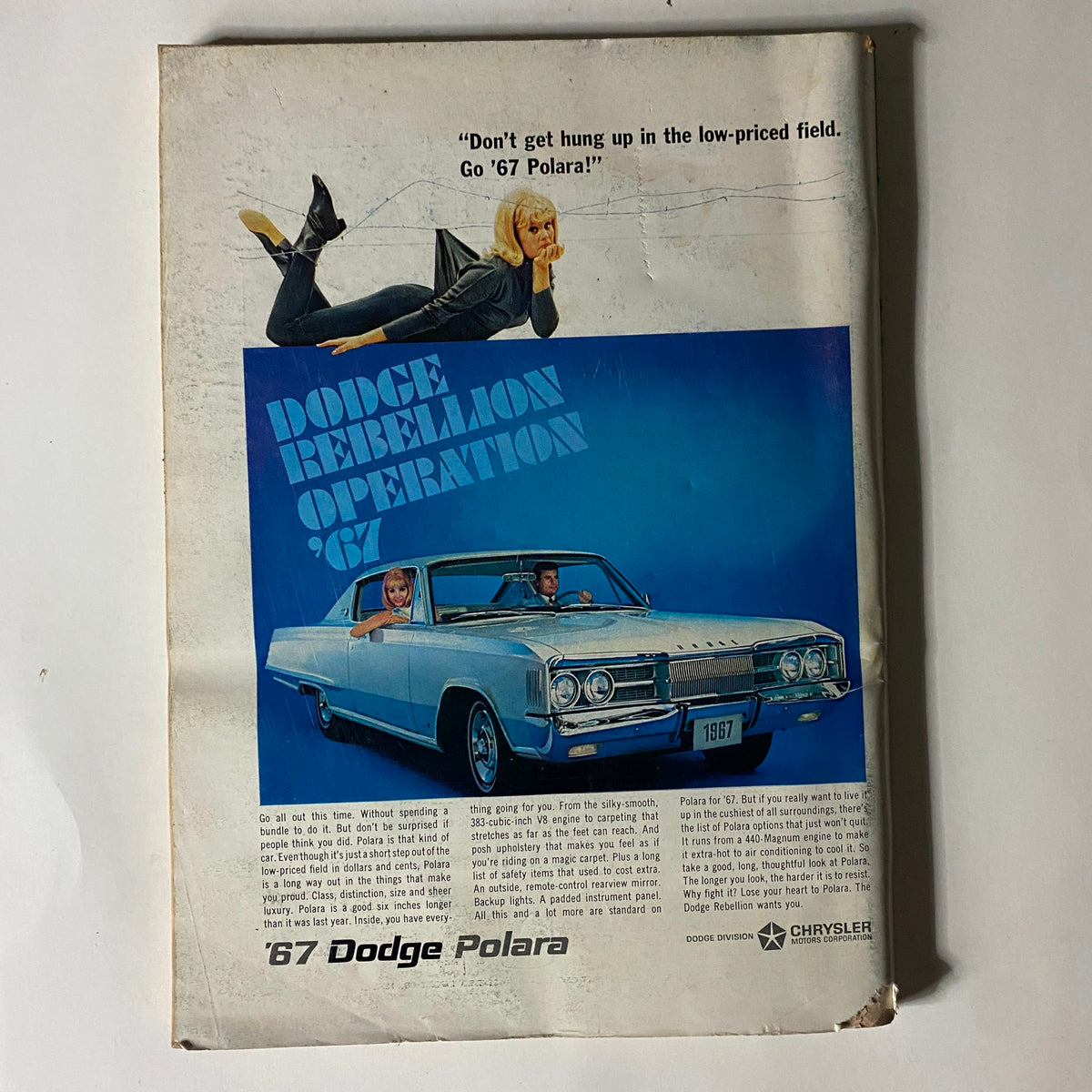 Back cover of The New Yorker magazine, October 29, 1966, featuring a vintage advertisement for the 1967 Dodge Polara with a model and car illustration.