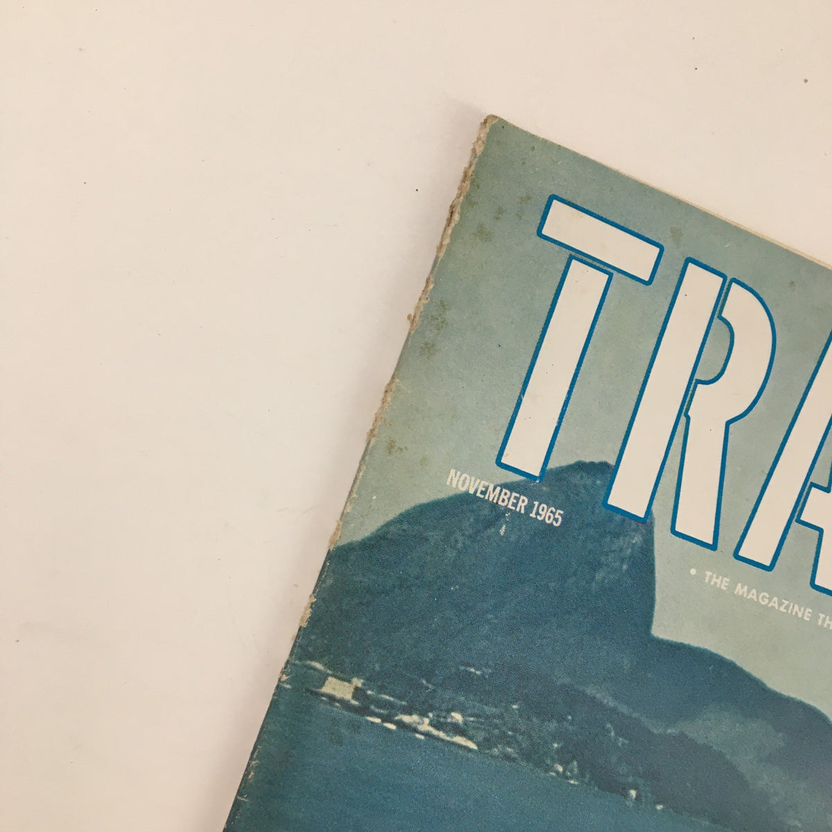 Detail of the cover of VTG Travel Magazine November 1965, highlighting the magazine title and the date, along with scenic background imagery.