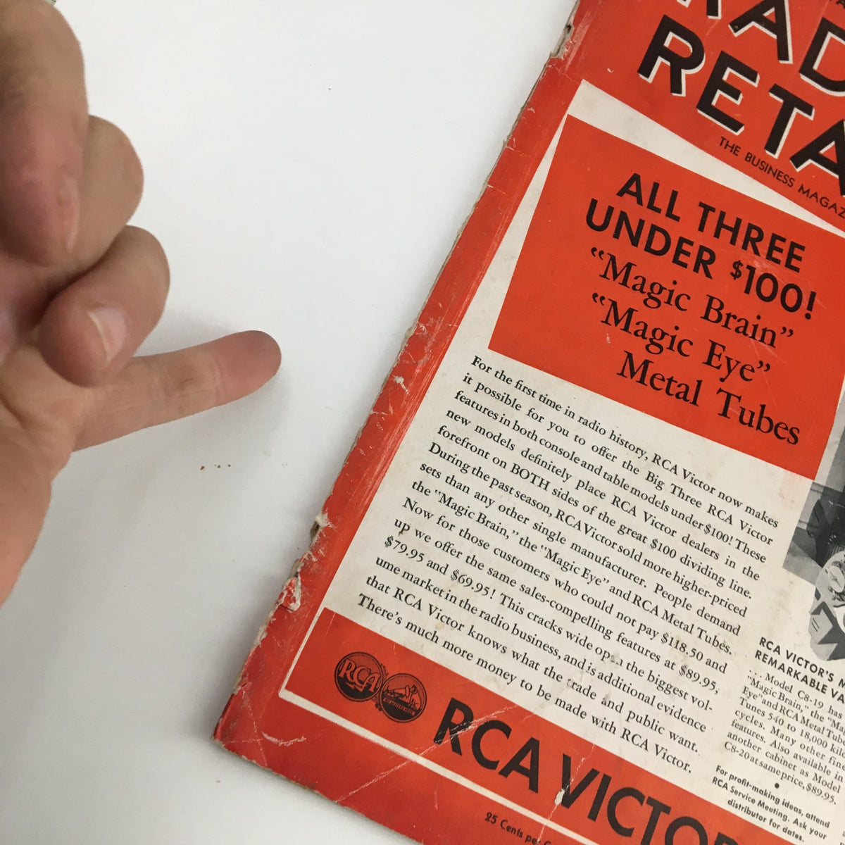 Close-up of the front cover of Radio Retailing Magazine January 1936, showing details about Magic Brain, Magic Eye, and Metal Tubes, emphasizing RCA Victor's affordable radio models.