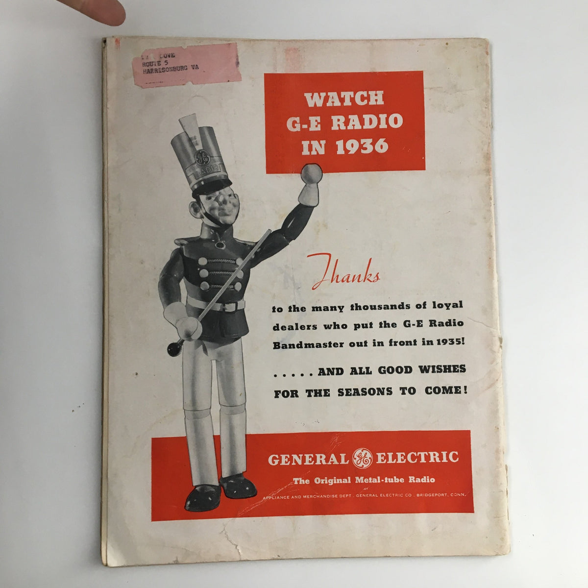 Back cover of Radio Retailing Magazine January 1936 showing a General Electric ad with a soldier figure promoting G-E radios.