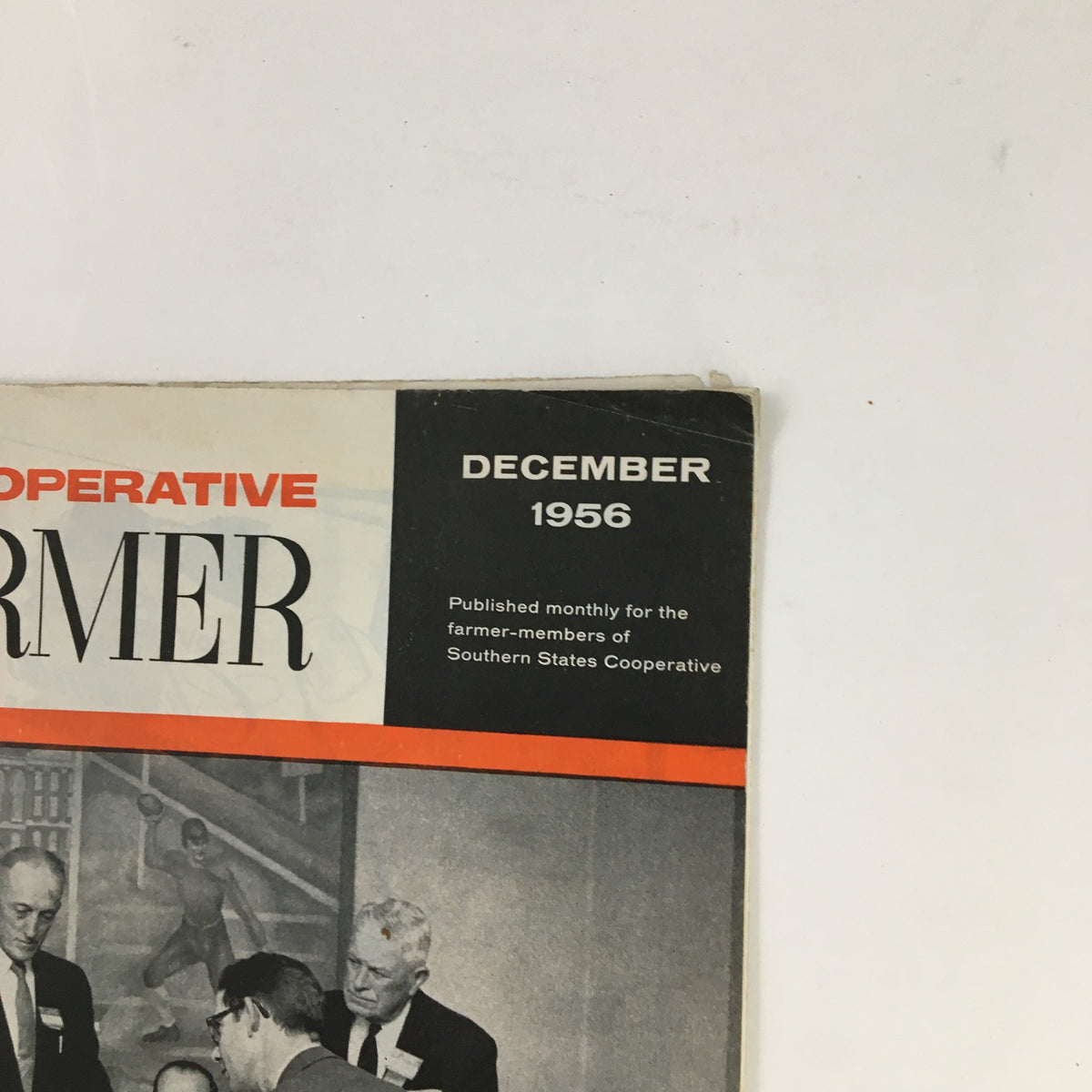 Close-up of the top section of Cooperative Farmer Magazine December 1956, emphasizing the magazine's title and publication month.