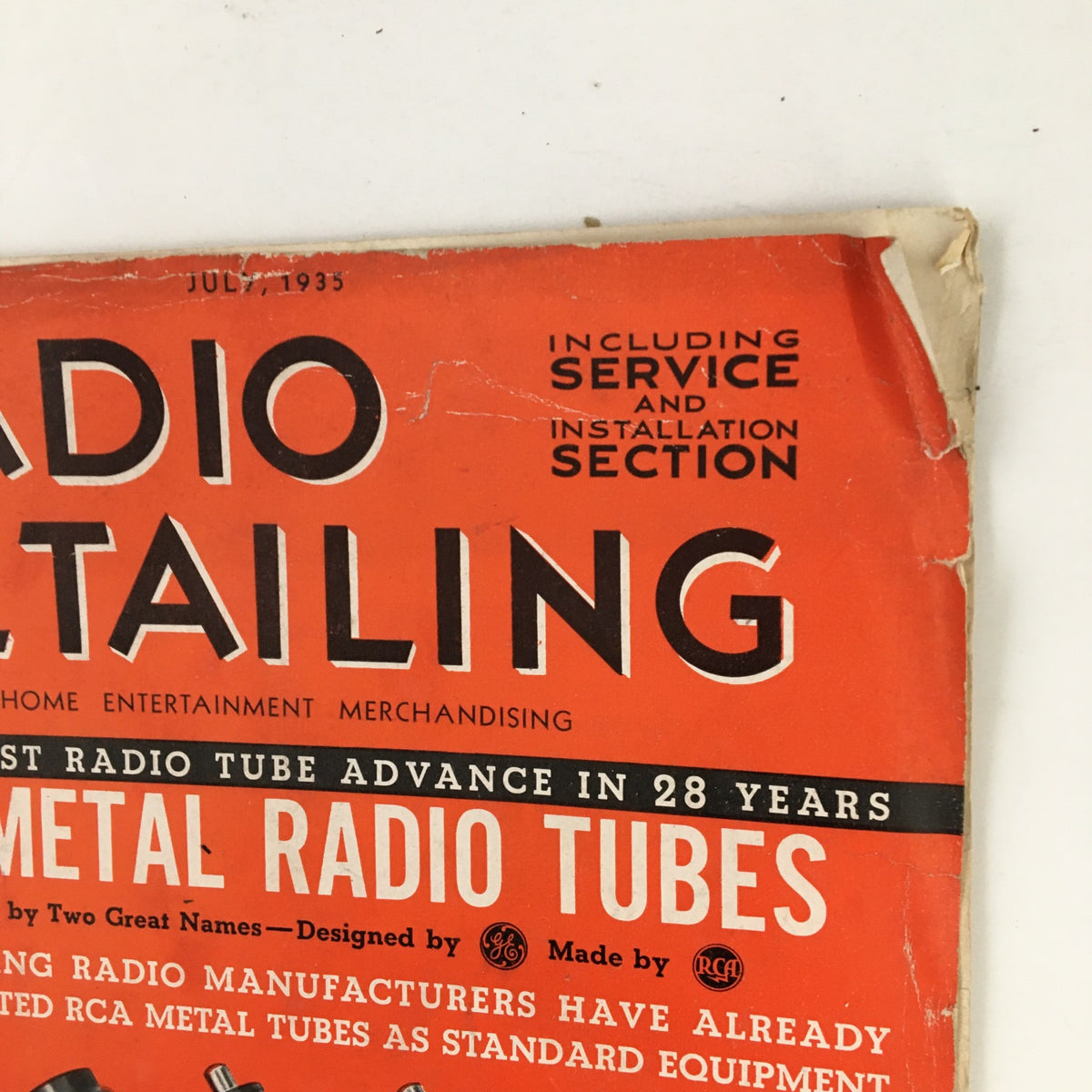 The cover page of Radio Retailing Magazine July 1935 showcasing the title and the theme of all-metal radio tubes, emphasizing home entertainment and merchandising.