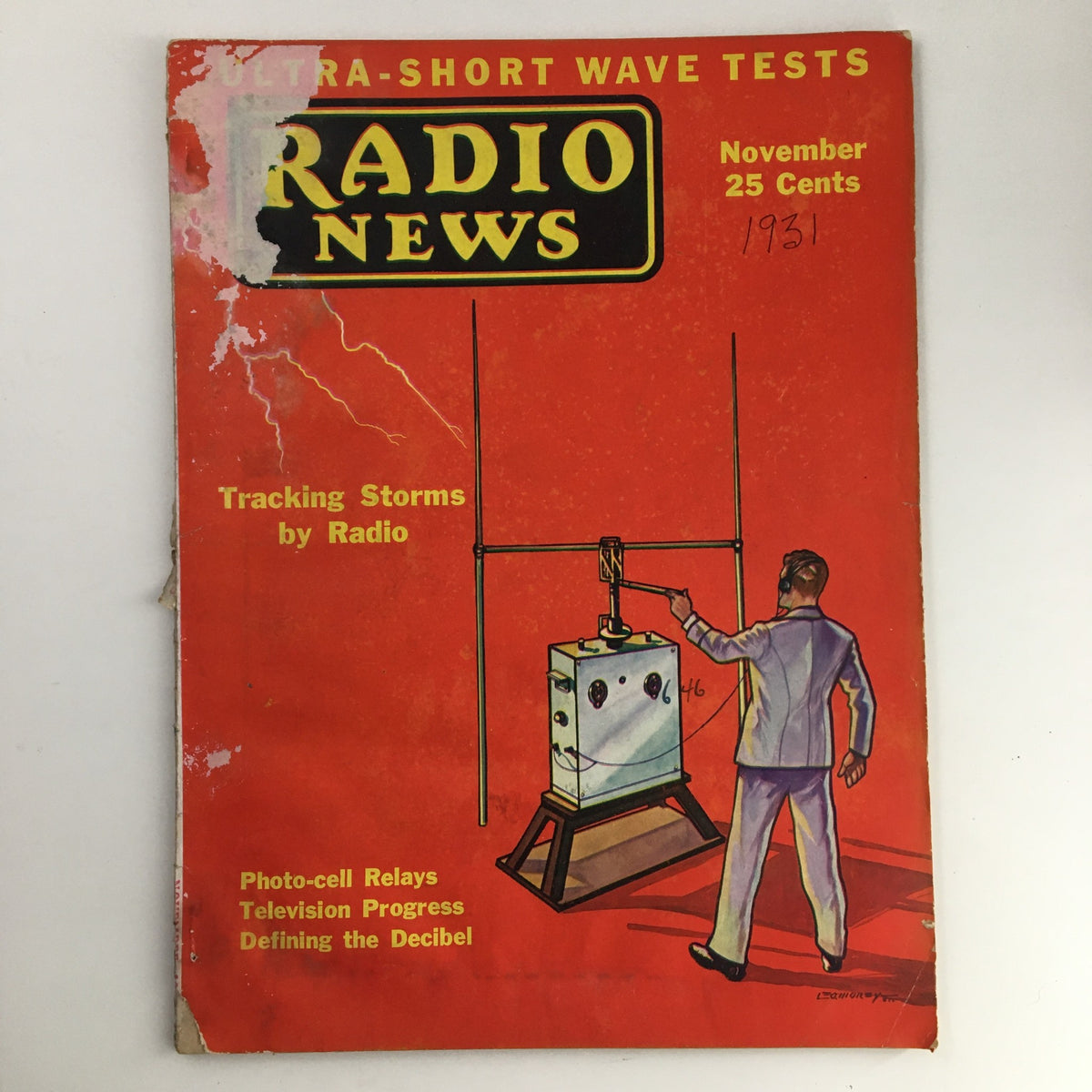 Cover of Radio News Magazine November 1931 featuring tracking storms by radio, showcasing photo-cell relays and television progress.