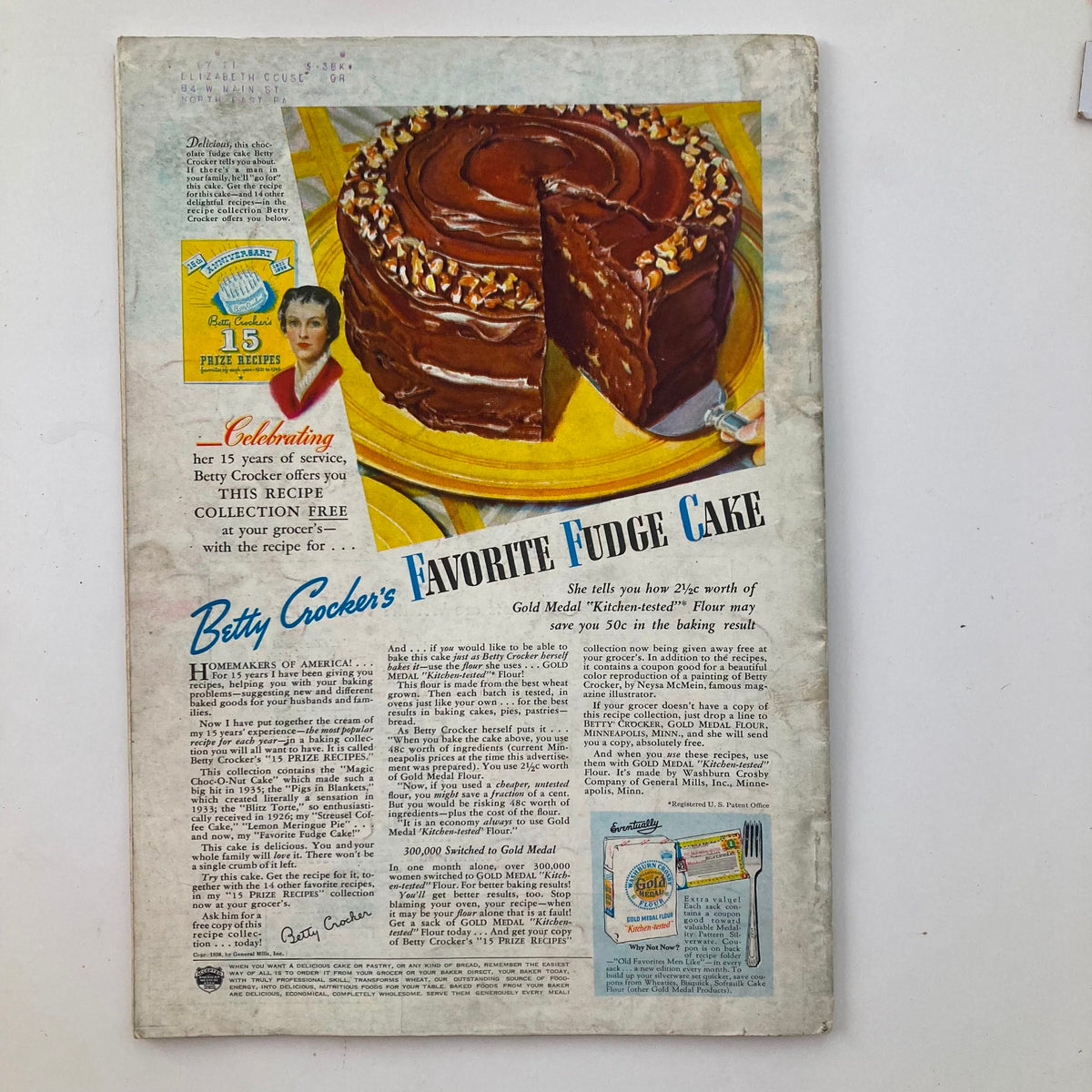 Back cover of Better Homes & Gardens Magazine November 1936 featuring an advertisement for Betty Crocker's Favorite Fudge Cake, celebrating cooking and home baking.