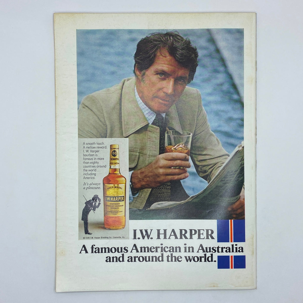 The New Yorker Complete Magazine August 16, 1976 featuring a vintage advertisement for I.W. Harper bourbon, showcasing a well-dressed man enjoying a drink by a waterfront.