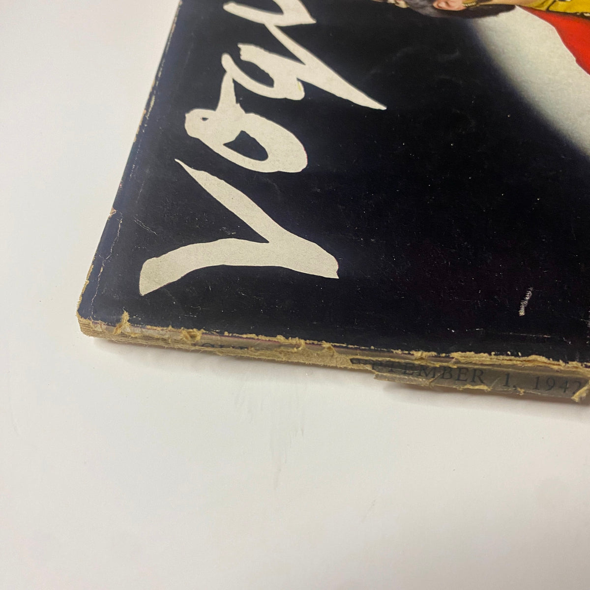 Close-up view of Vogue Magazine cover from September 1, 1942 featuring Meg Mundy, by John Rawlings. The magazine shows signs of wear on the edges.