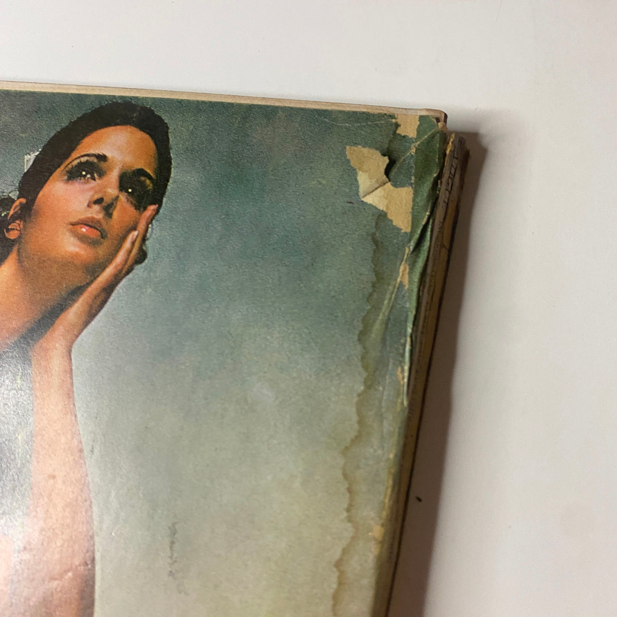 Vogue Magazine April 1, 1969 Suzy Kendall Cover by David Bailey featuring a vintage portrait with damage noted, reflecting its historical significance.