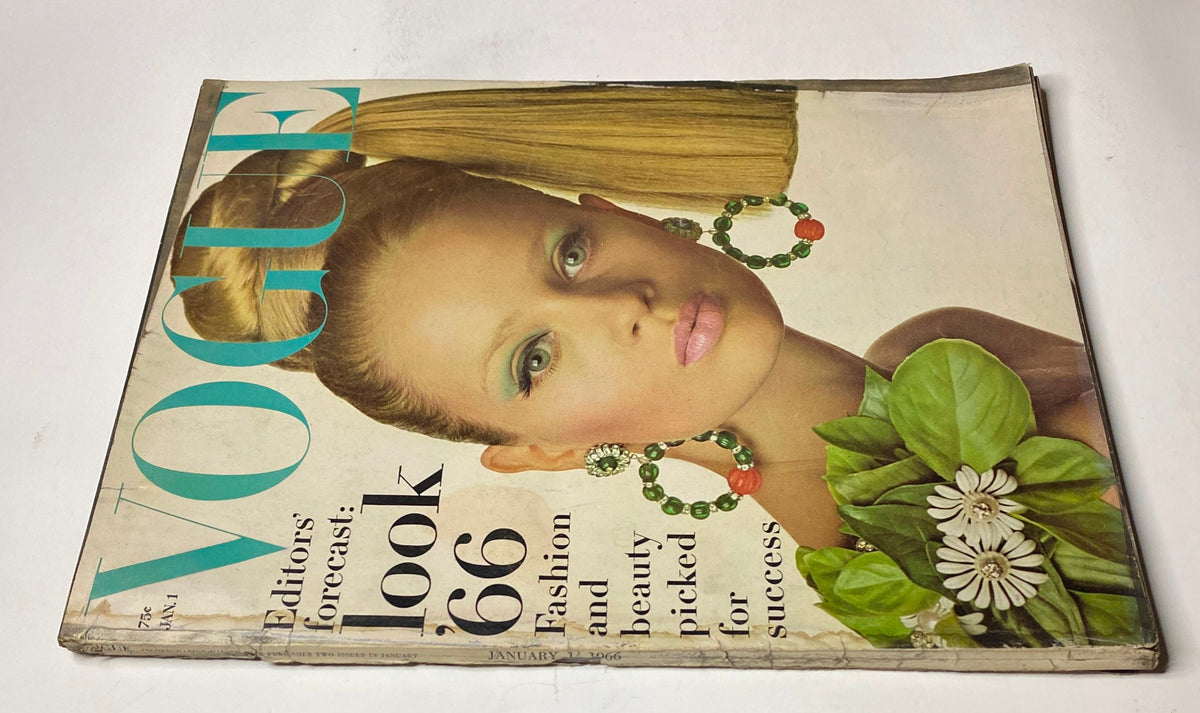 Vogue Magazine January 1, 1966 cover featuring model Celia Hammond, photographed by Irving Penn, showcasing a vibrant fashion look with prominent makeup and earrings.