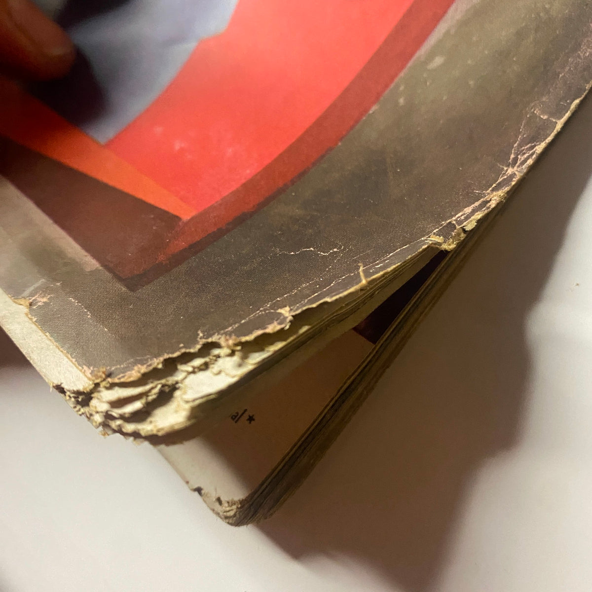 Vogue Magazine March 15, 1943 Dana Jenney, Sabine Weber GD Interior - Close-up of the magazine's spine showing signs of wear and tear.