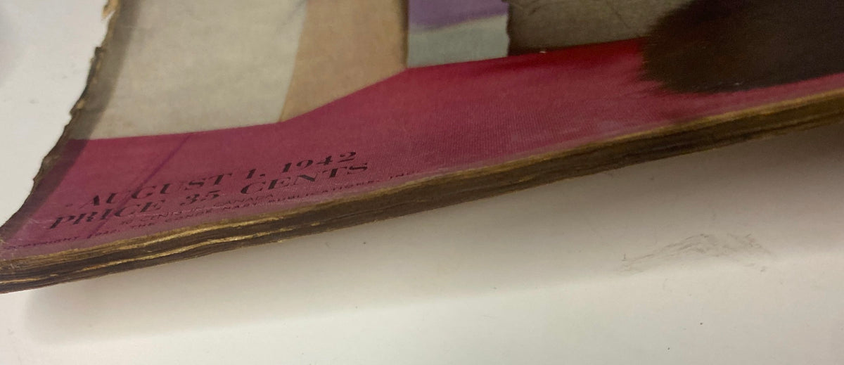 Close-up of the back cover edge of Vogue Magazine August 1, 1942, depicting Lenore Simon, highlighting vintage elements and condition details.