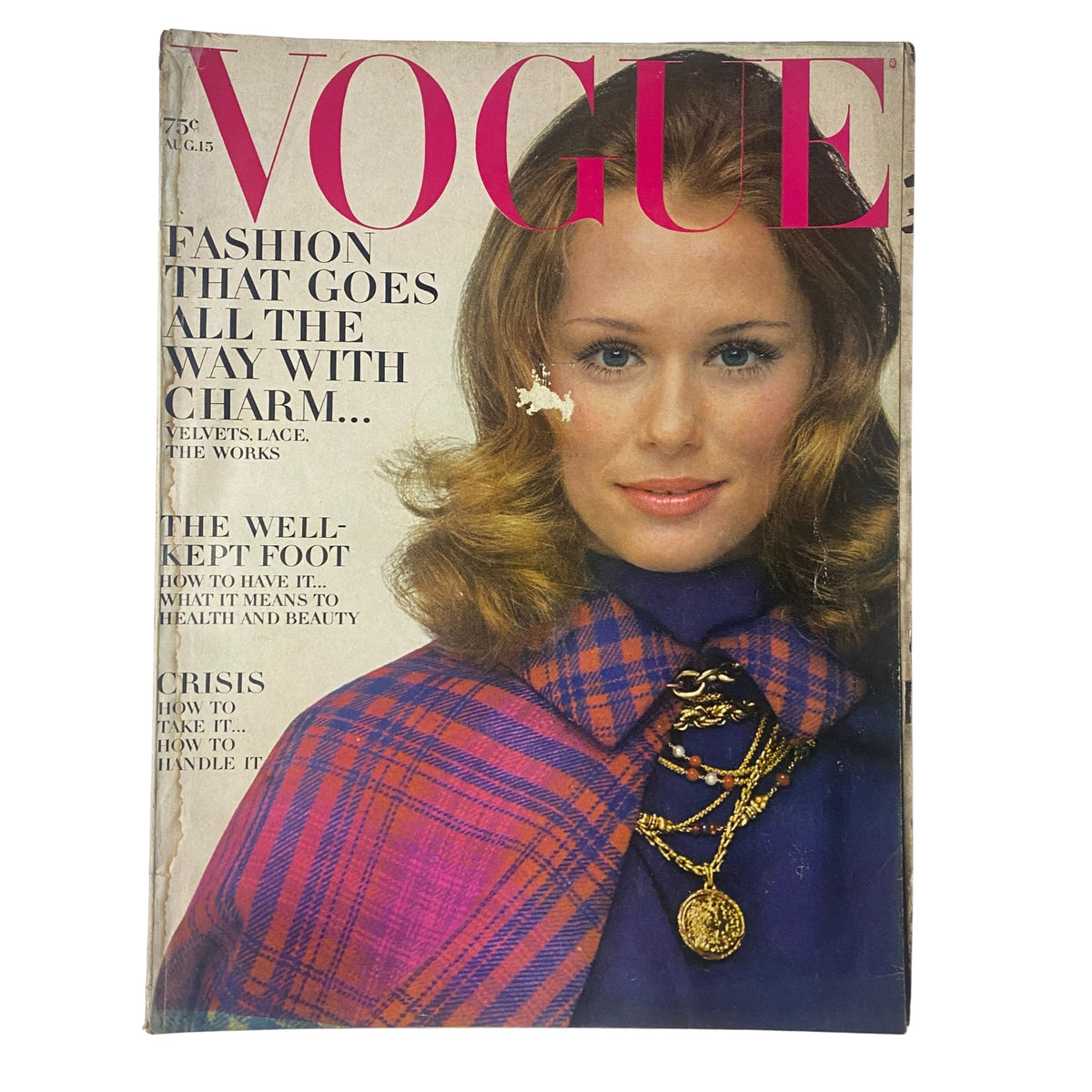 Vintage Vogue Magazine from August 15, 1968 featuring a Lauren Hutton cover designed by Gianni Penati, showcasing a model with styled hair wearing a fashionable cape.