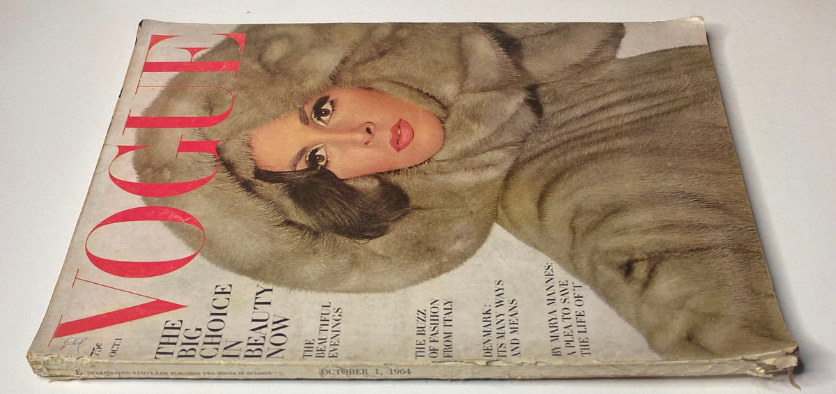 Vogue Magazine October 1, 1964, showcasing Wilhelmina Cooper on the front cover with elegant fur fashion, reflecting the style and culture of the 1960s.