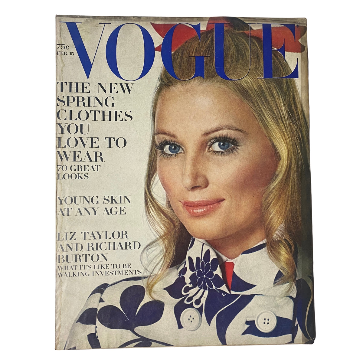 Vogue Magazine February 15, 1969 cover featuring Evelyn Kuhn, captured by Irving Penn, showcasing fashion trends with a focus on spring styles and bold accessories.