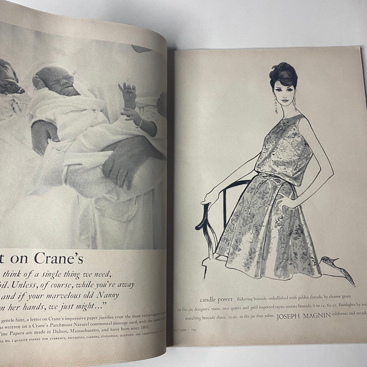 Fashion advertisement from Vogue Magazine October 1, 1961 featuring a dress design highlighted with intricate detailing and a model holding an accessory.