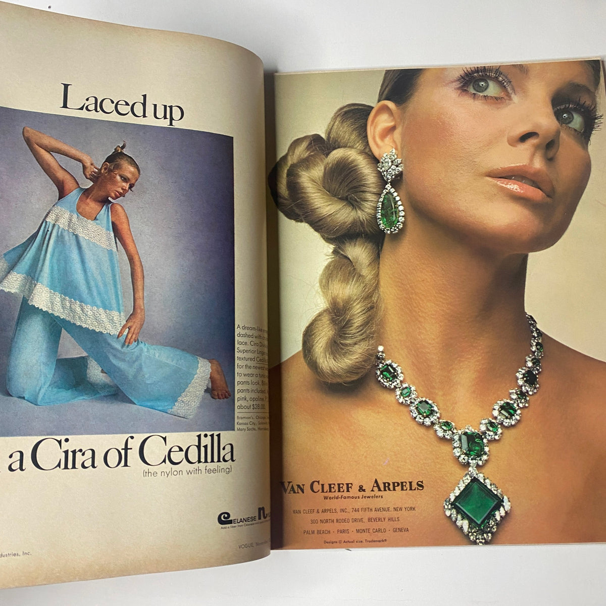 Jewelry advertisement in Vogue Magazine November 15, 1969 featuring a model adorned with green gemstone jewelry from Van Cleef & Arpels.