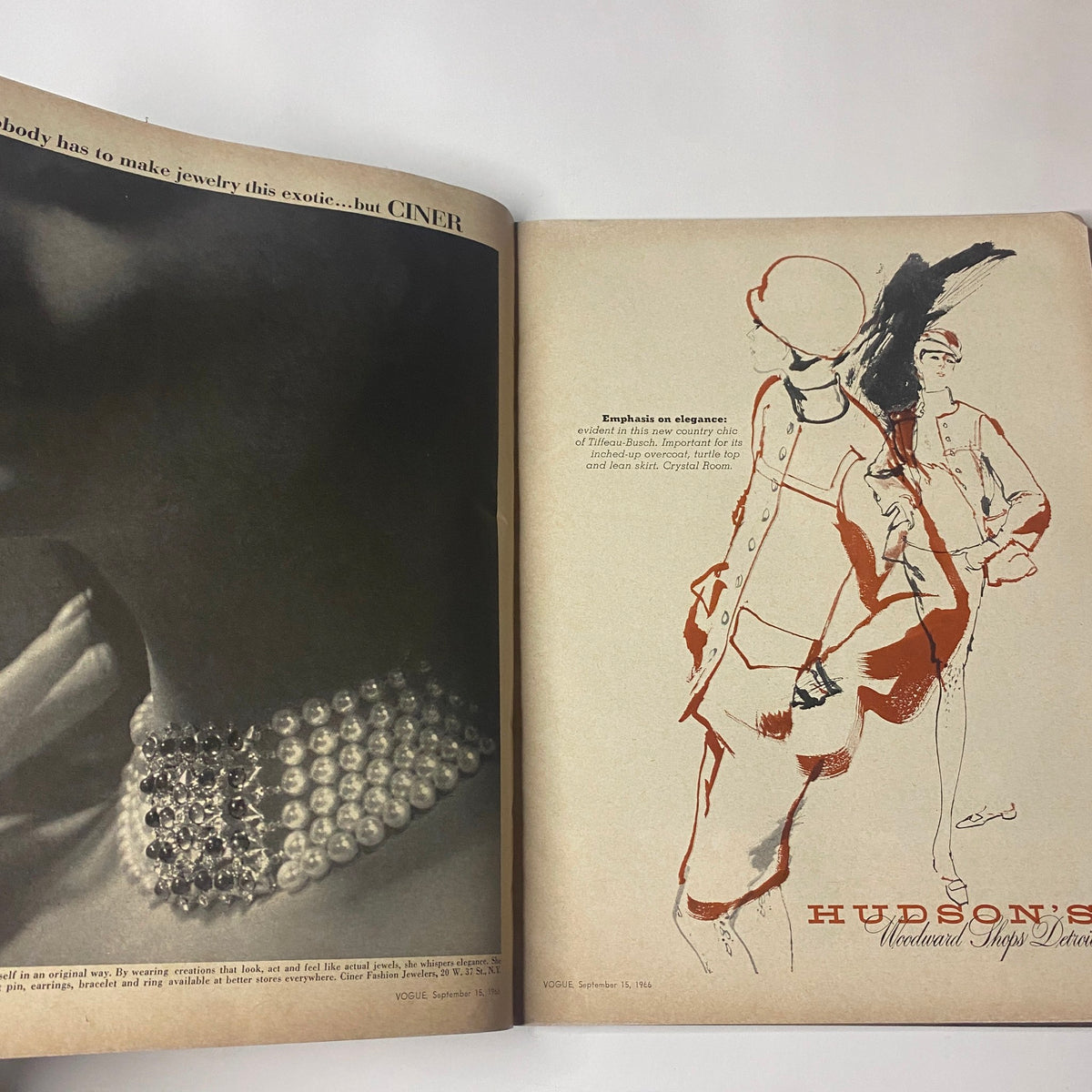 A vintage advertisement for jewelry in Vogue Magazine September 15, 1966, showcasing an elegant collar pearl necklace and a stylish model illustration, highlighting design aesthetics of the era.