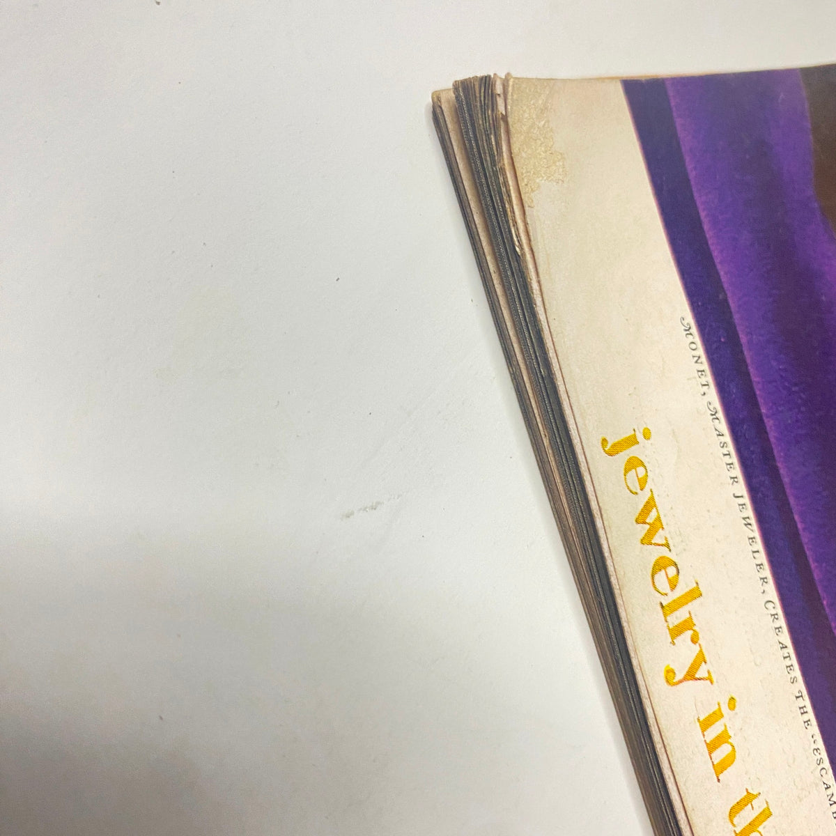 Close-up of the spine of Vogue Magazine September 15, 1966, illustrating the vintage character of the magazine, including edge fading and texture details that highlight its collectible nature.