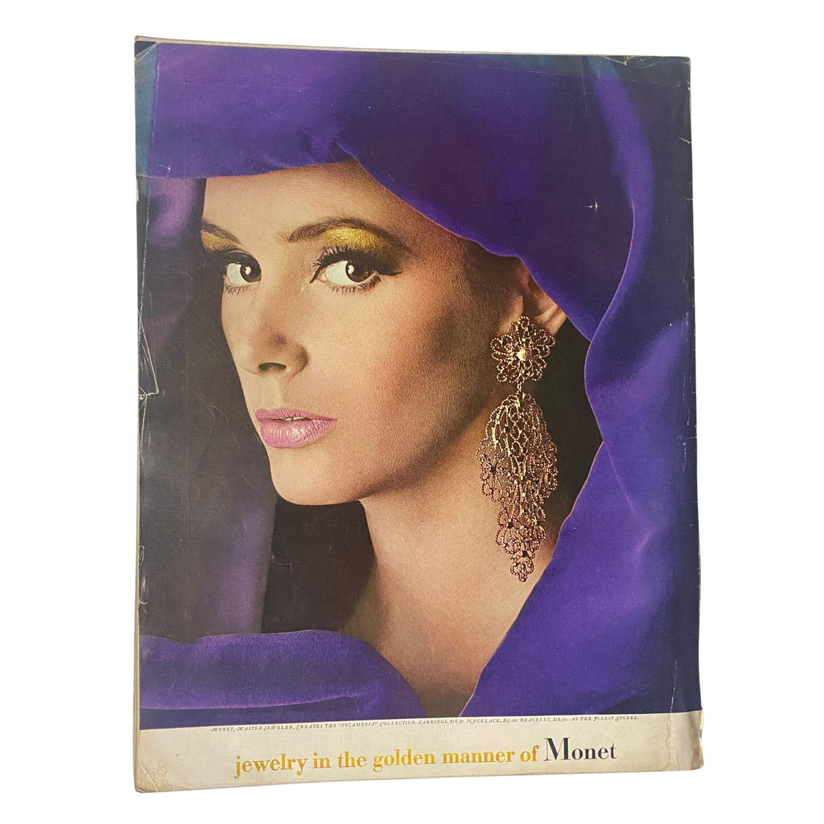 Cover of Vogue Magazine September 15, 1966 featuring a striking portrait of a model adorned with jewelry in the golden manner of Monet, showcasing the magazine's emphasis on high fashion.