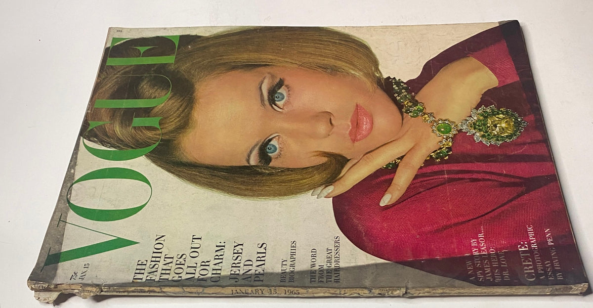 Close-up view of Vogue Magazine January 15, 1965, highlighting the cover with model Veruschka. Photographed by Irving Penn, this issue captures the essence of 1960s fashion, showcasing styles such as jersey and pearls.