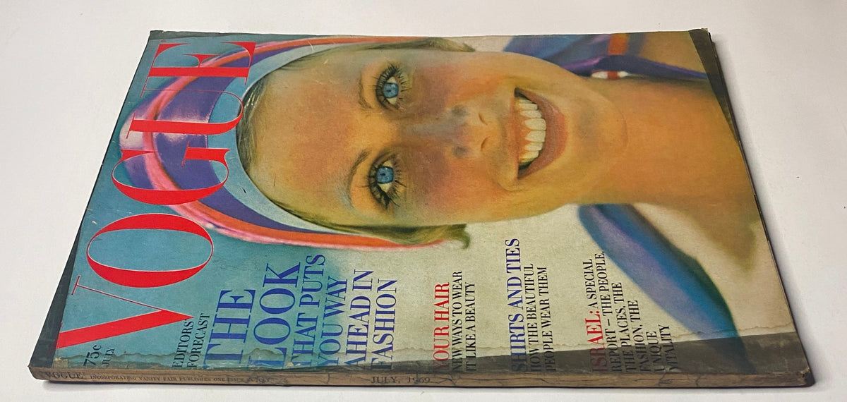 Vogue Magazine July 1969 cover highlighting Susanne Schöneborn with bold styling, captured by John Cowan, reflecting the fashion trends of the late 1960s.