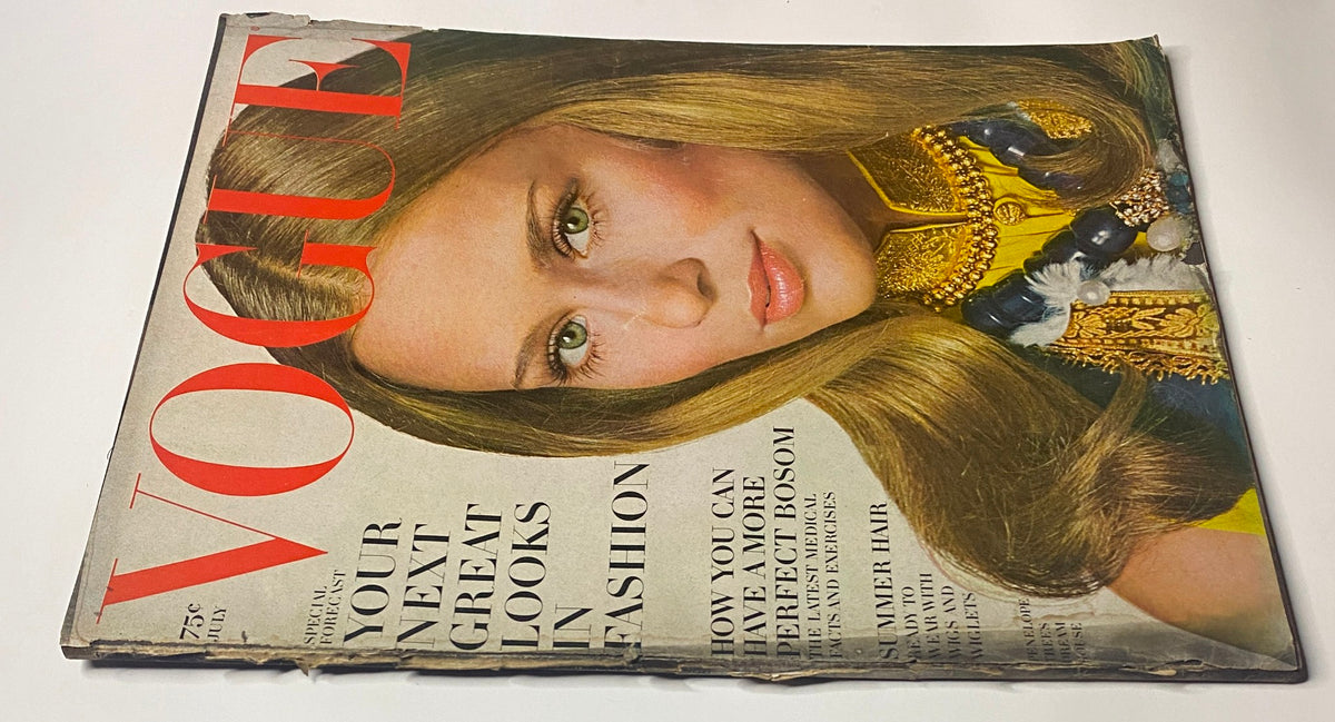 Close-up of Vogue Magazine July 1968 cover, highlighting Lauren Hutton's striking features and elegant hairstyle, as captured by Irving Penn.