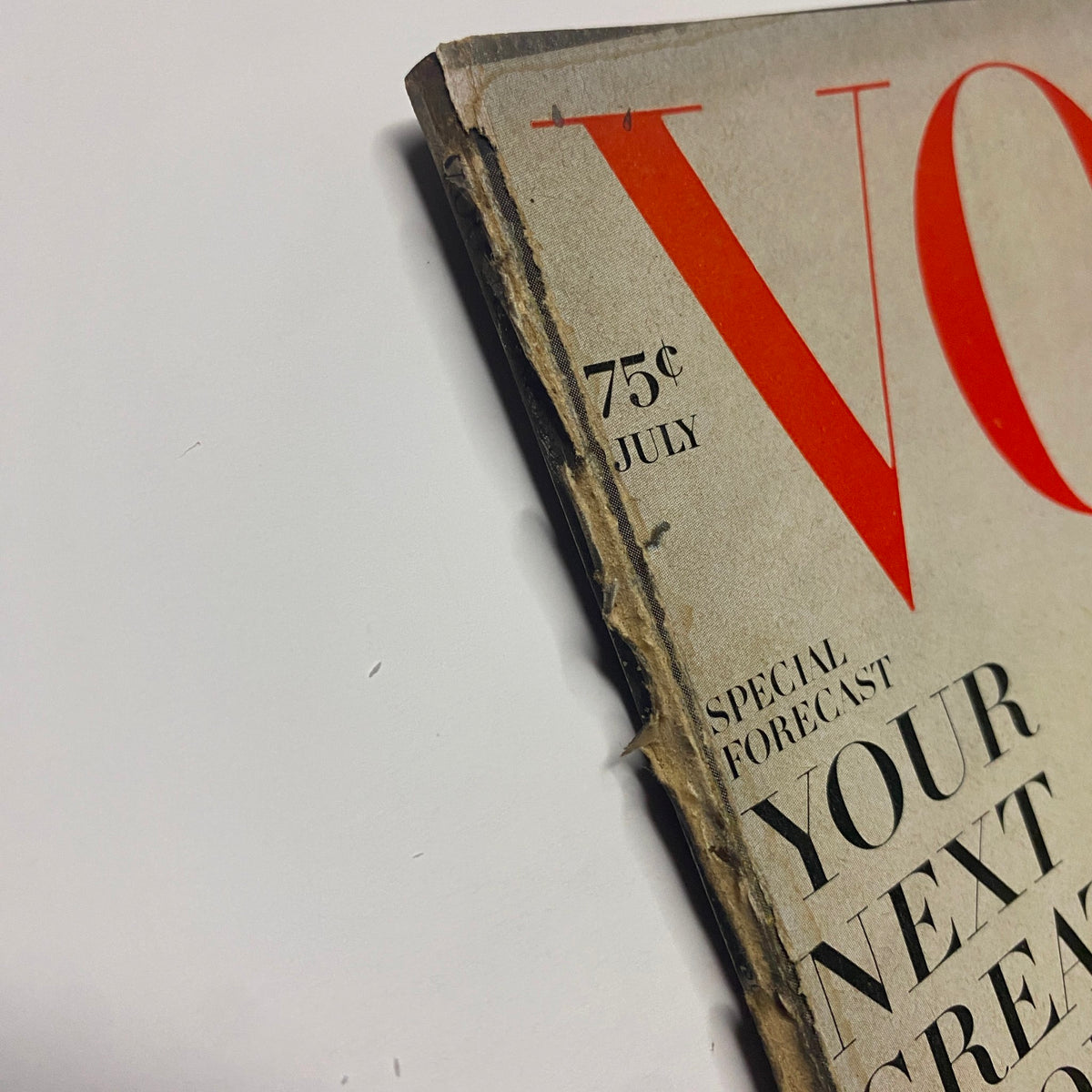 Side view of Vogue Magazine July 1968 showing its spine and cover details, indicating the magazine's vintage condition and design by Irving Penn.