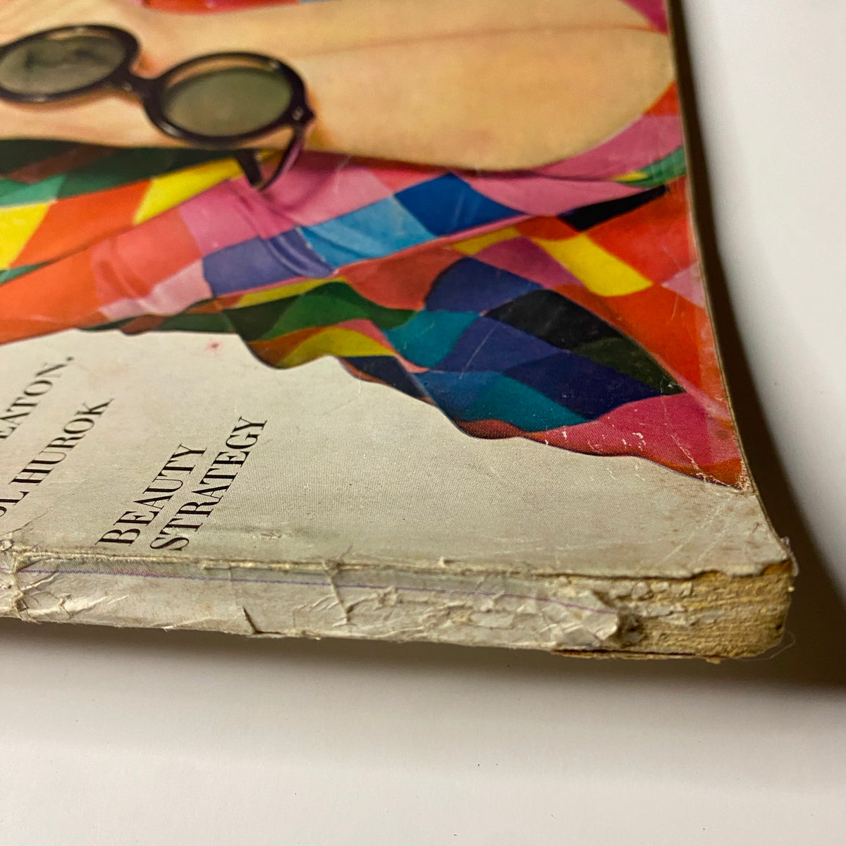 Cover of Vogue Magazine April 1, 1964 featuring Brigitte Bauer, photographed by Irving Penn, showcasing a colorful and artistic design with vintage style.