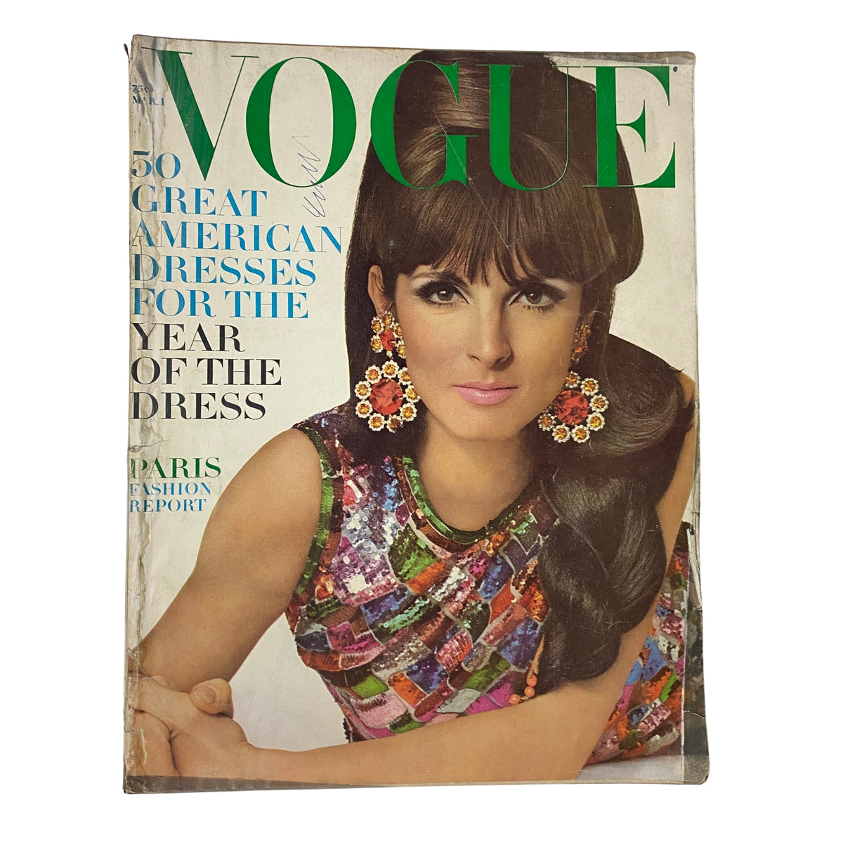Vogue Magazine March 1, 1966 cover featuring model Mirella Petteni, captured by Irving Penn, showcasing 50 great American dresses for the Year of the Dress.