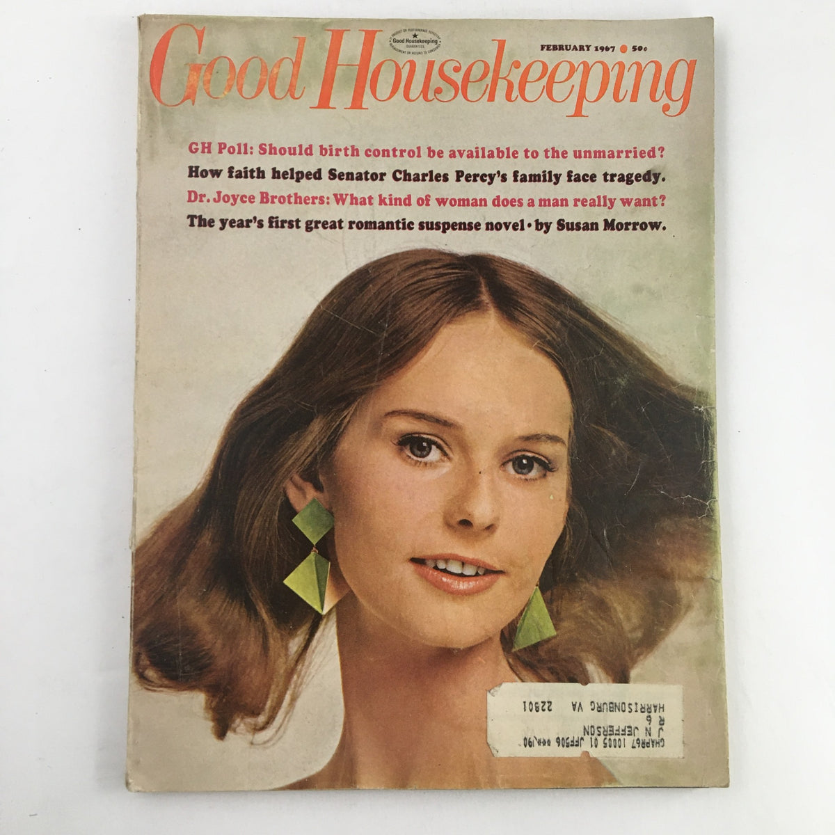 Cover of Good Housekeeping Magazine February 1967 featuring a young woman with long hair and large green earrings, showcasing the issue's focus on family and personal stories related to Senator Charles Percy's family tragedy.