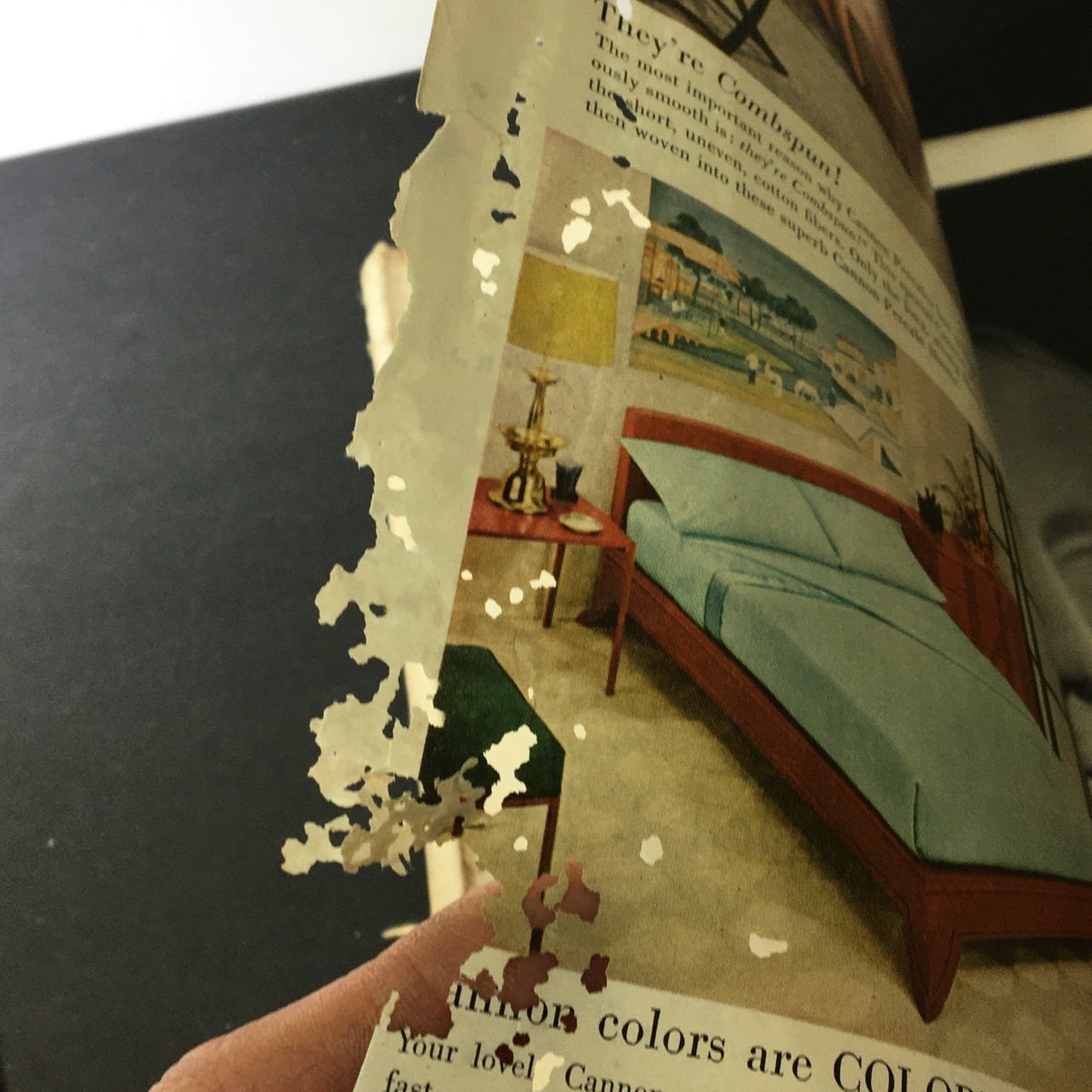 Vintage December 1954 VTG Journal Magazine page with torn edges showcasing colorful interior design advertising.