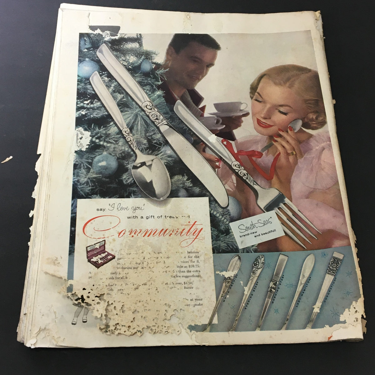 VTG Journal Magazine December 1954 cover featuring an advertisement with vintage cutlery and a festive scene, showcasing the charm of 1950s design.