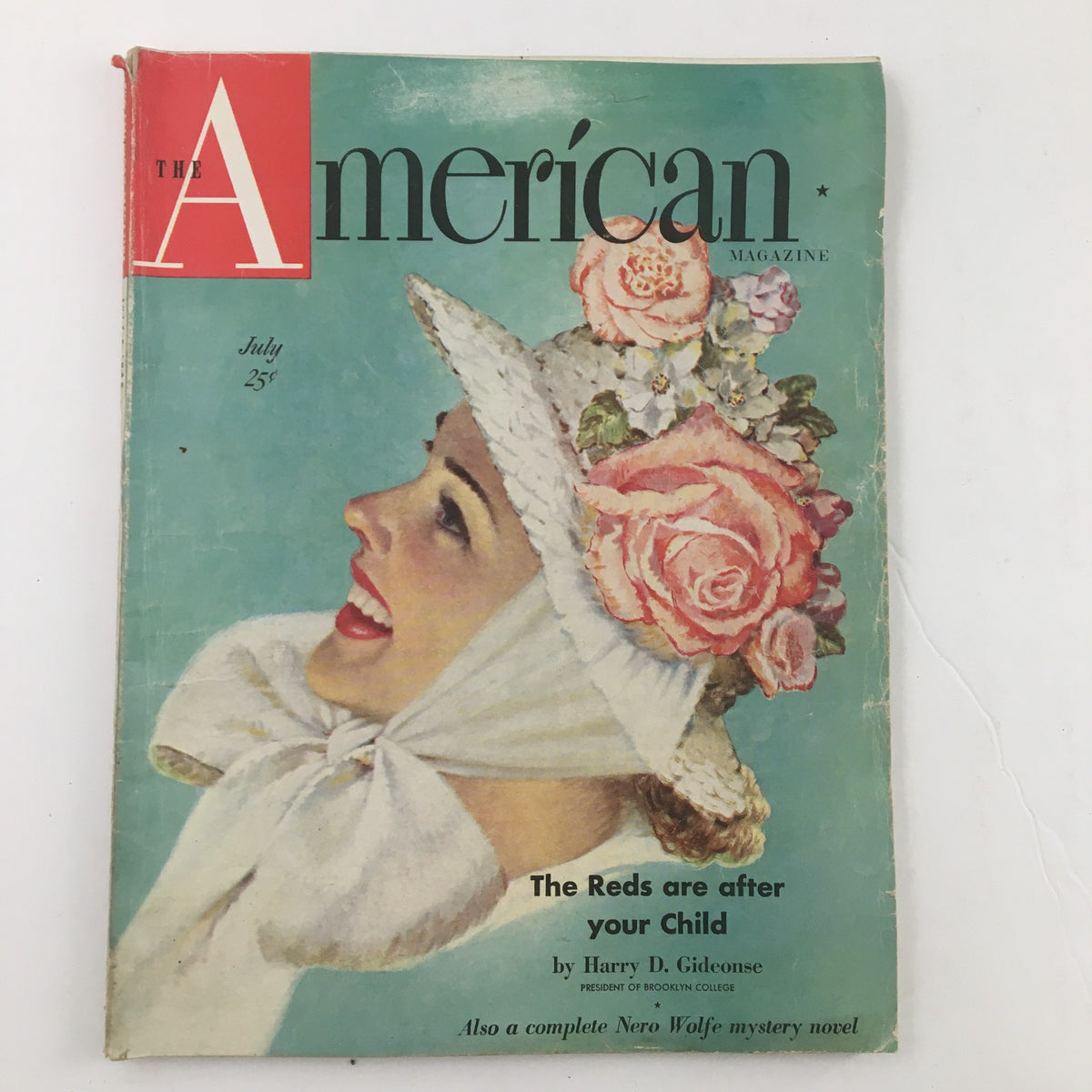 Another view of the cover of The American Magazine from July 1948 showcasing the headline The Reds Are After Your Child with a smiling woman in a floral hat.