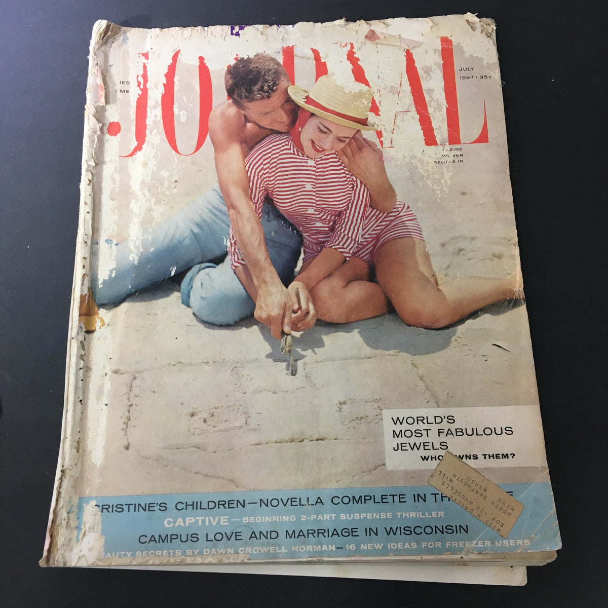 Vintage Journal Magazine July 1957 featuring a couple on the cover, showcasing themes of Queen Elizabeth, campus love, and marriage in Wisconsin.